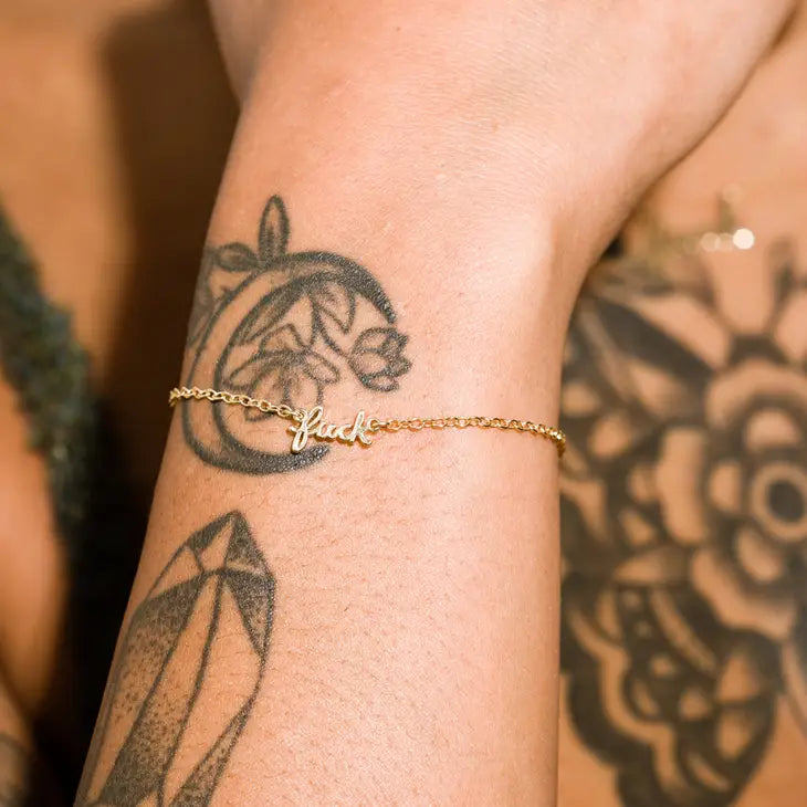 Dainty F* gold chain bracelet
