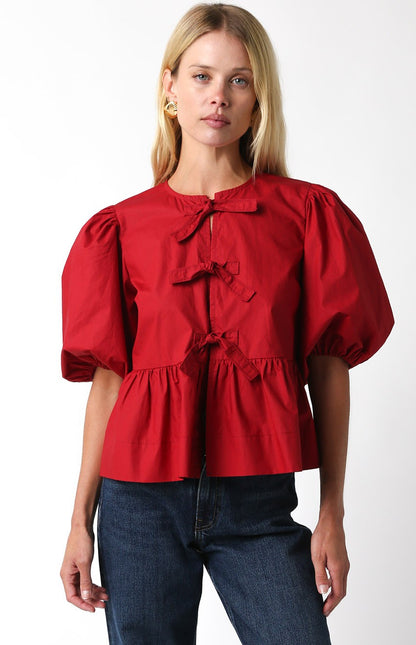 three tie puff sleeve blouse, dark red peplum top, fall 2024 bow front tie shirt