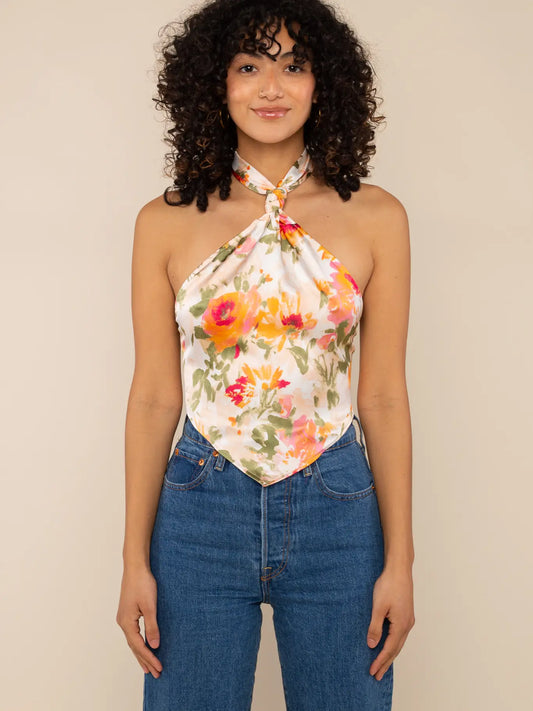 A floral satin halter cropped top for easy to wear summer outfits.