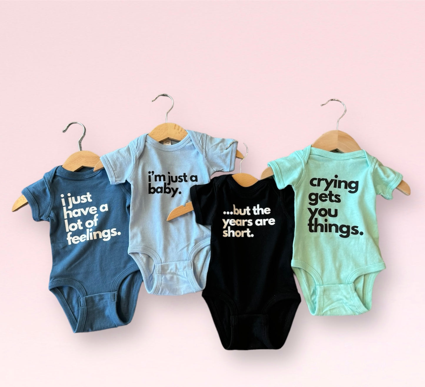 crying gets you things baby onesie