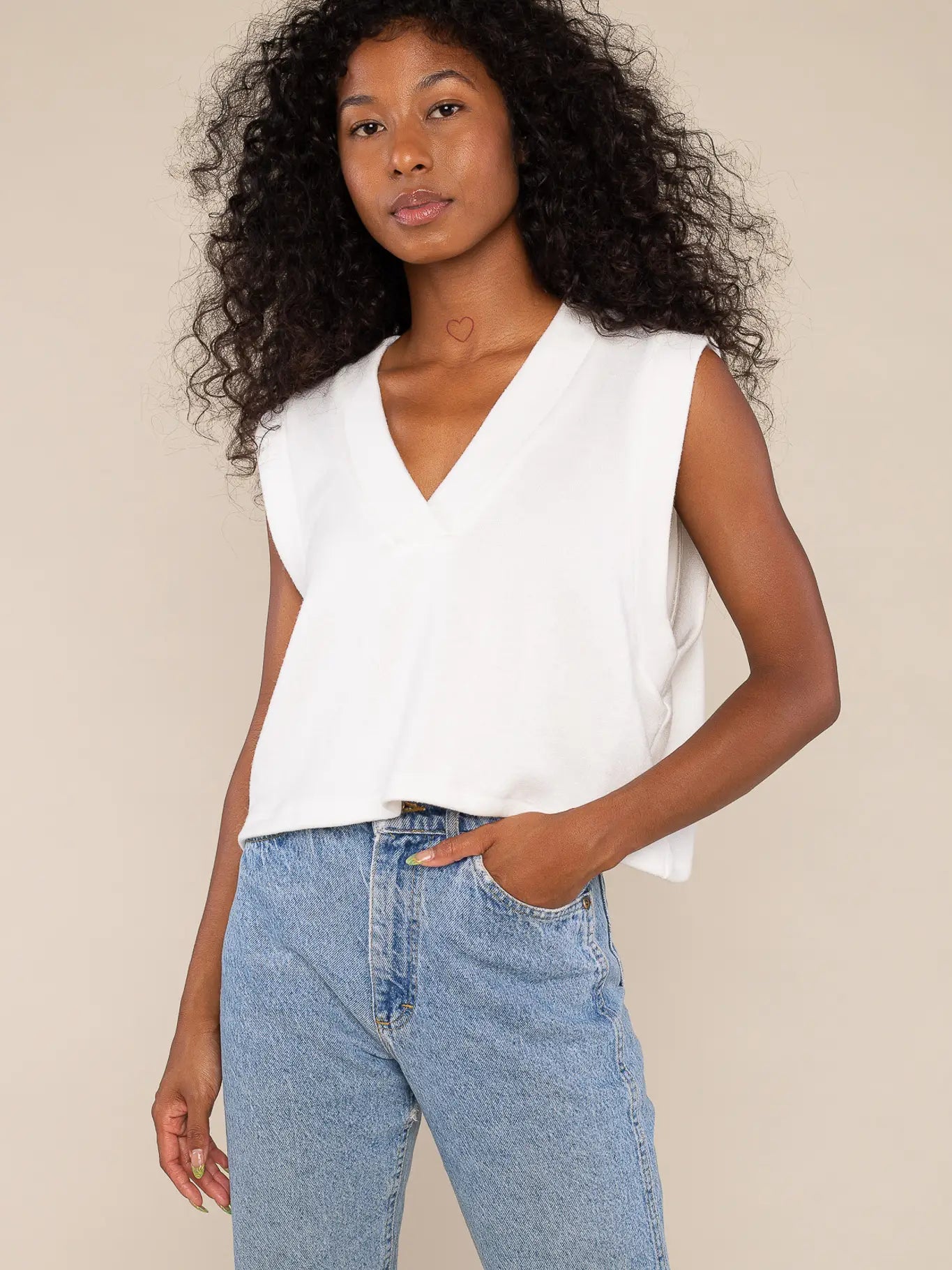 cal v neck cropped sweater vest in ivory