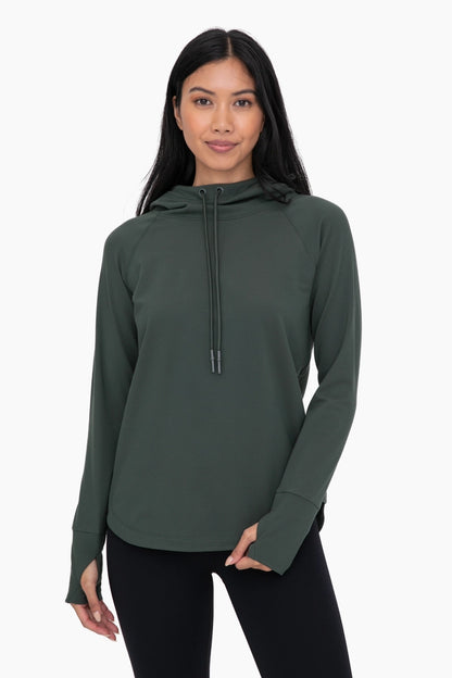 Olive activewear with hood and thumb holes.