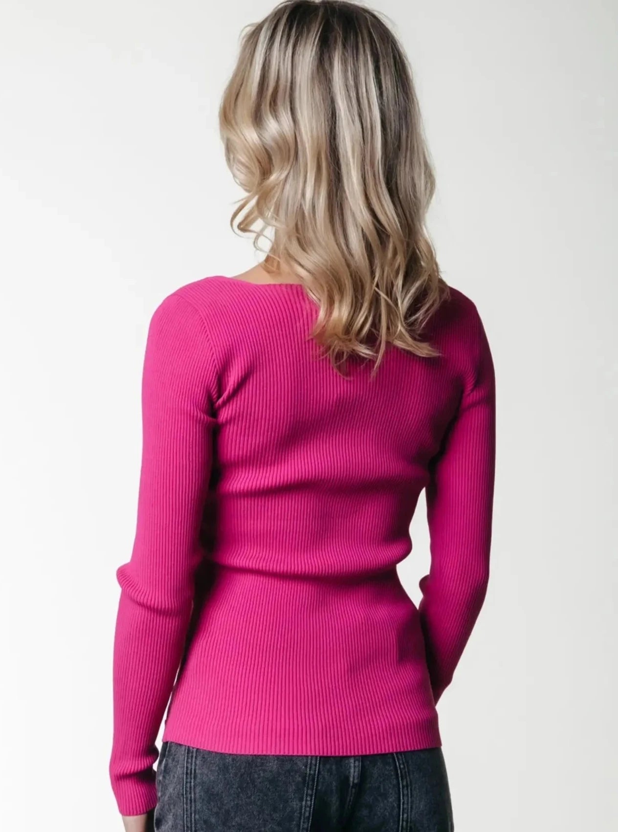 Stylish bright fuchsia square neck blouse with form fitting ribbed texture.