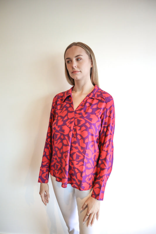 geometric top, viscose top, magenta top, purple top, collared top, v-neck top, long sleeve top, light and breathable, versatile top, office wear, casual wear.