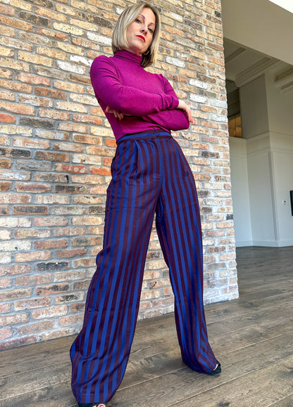 High waisted navy and dark burgundy striped pleated trousers by Frnch. Perfect for holiday parties and events.