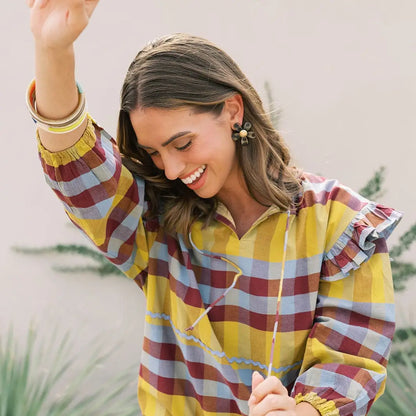 Plaid blouse with small ruffles at the shoulder featuring maroon, light blue, and yellow plaid pattern. Perfect for your fall photos and thanksgiving events.