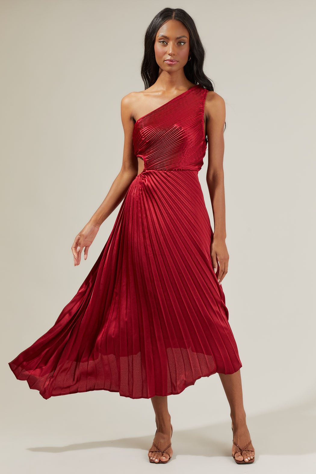 Ruby red pleated one shoulder midi dress featuring modest one side cut out, asymmetrical hem and gorgeous pleating throughout.