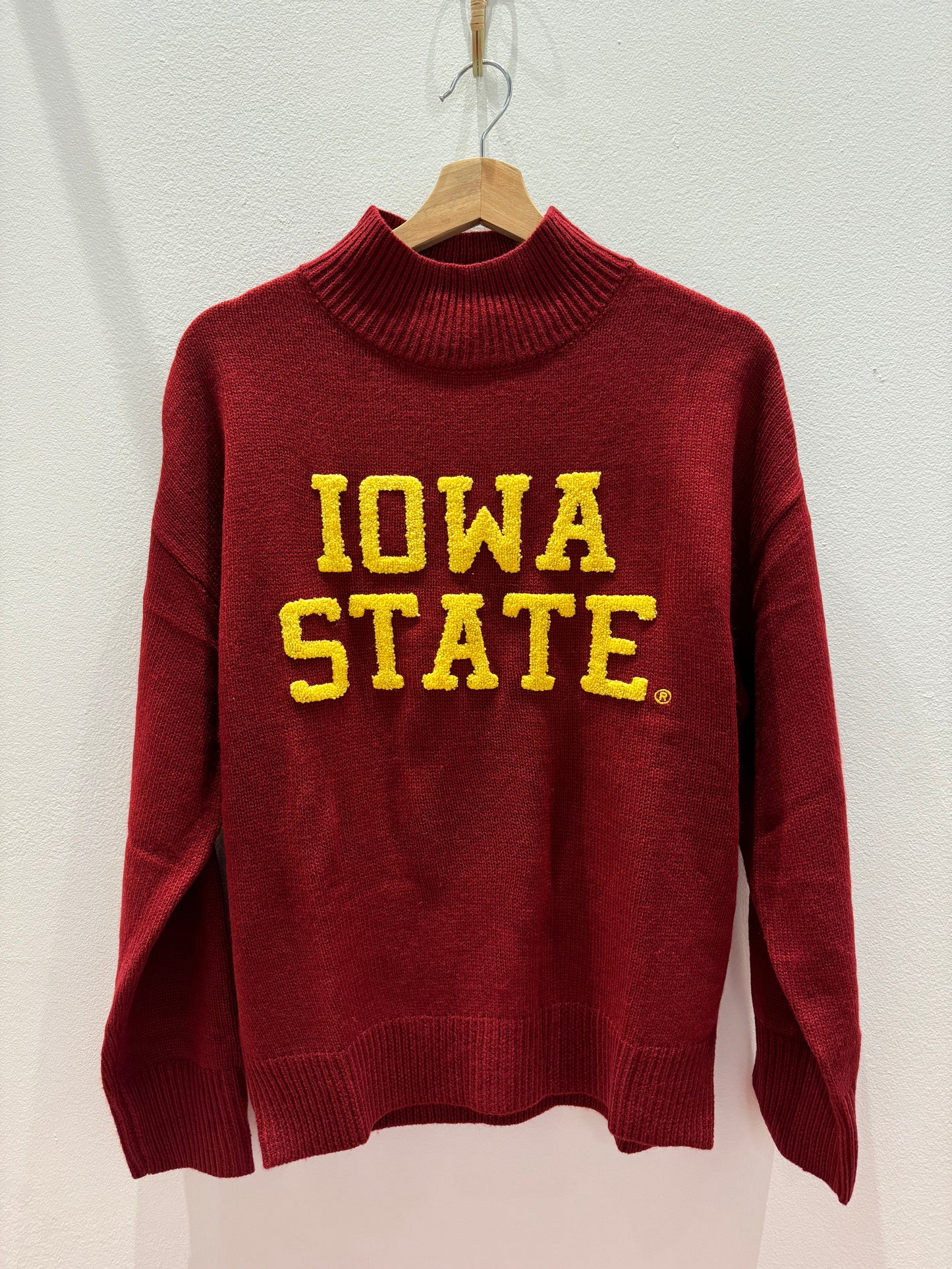 iowa state sweater featuring mock neck and bright yellow iowa state lettering.