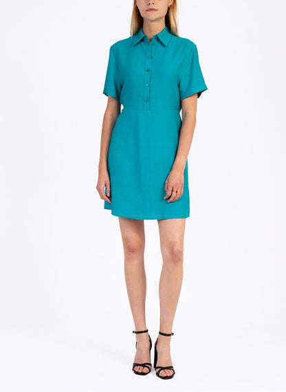 Short sleeve preppy button up collard dress in teal for work dress or summer outfit.