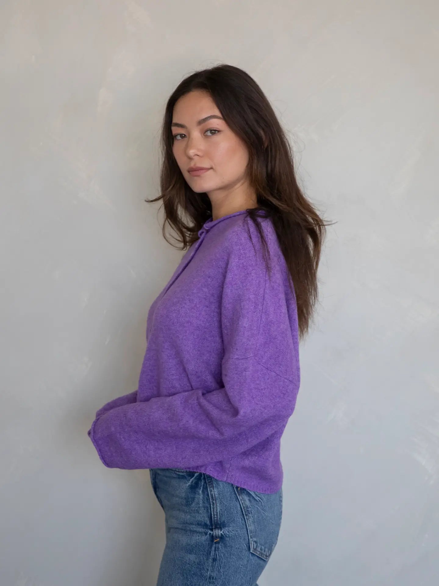 Light purple super soft cardigan featuring delicate small buttons closing the front. The loose fit cardigan sweater is perfect for every day wear.