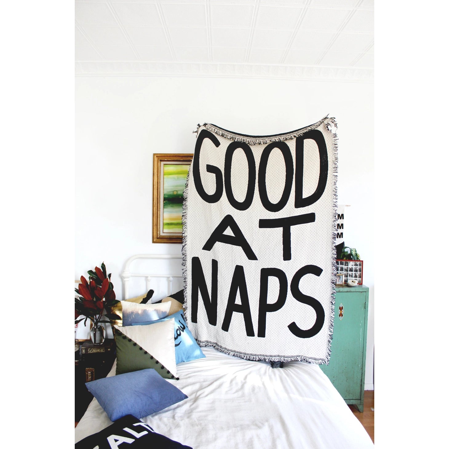Good At Naps knit blanket with fringe in black and white for home decor and gifts for her.